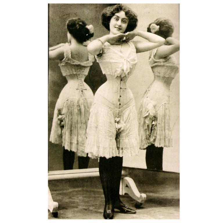 Photo of women in old fashioned undergarments